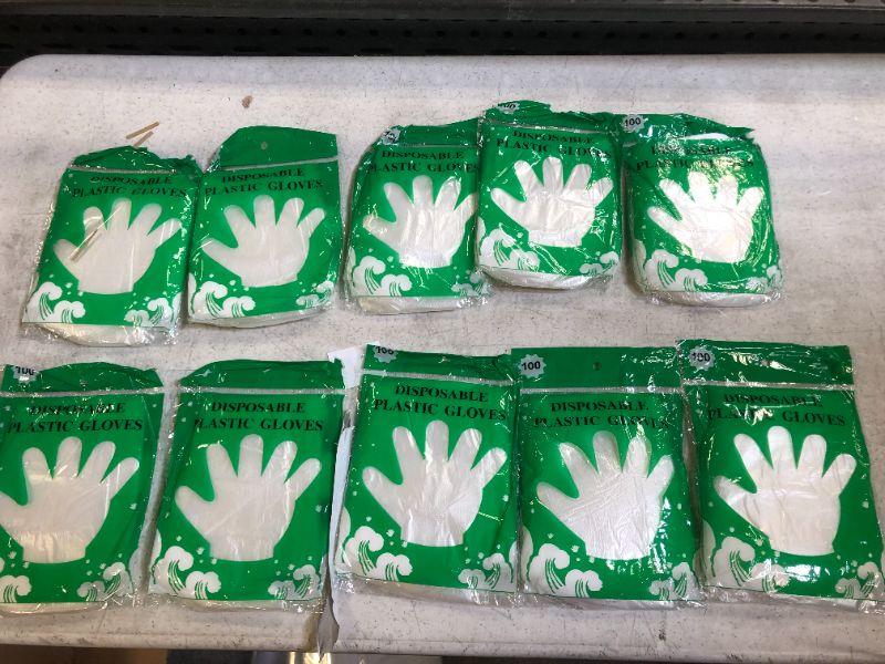 Photo 2 of 10 packs of 100 plastic disposable gloves