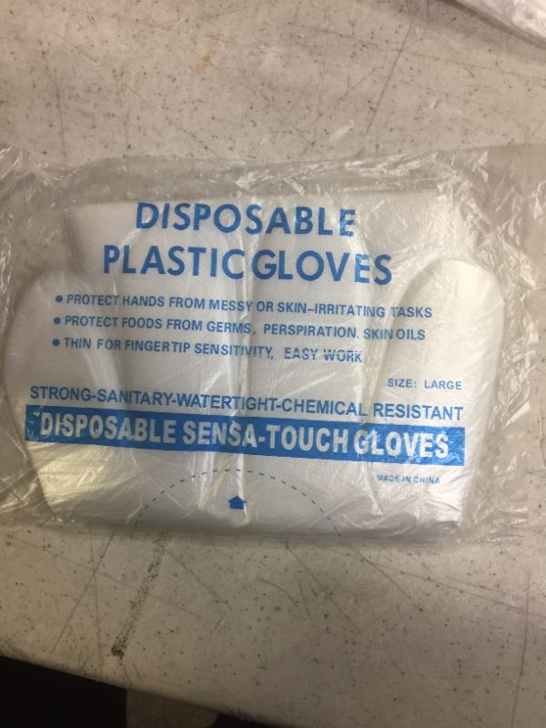 Photo 1 of 5 packs of 500 clear disposable gloves size large 