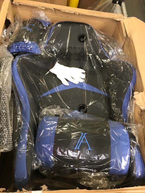 Photo 1 of blue and black generic gaming chair