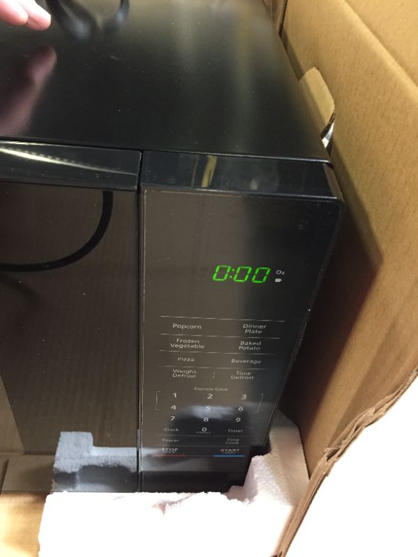 Photo 1 of Magic Chef
1.1 cu. ft. Countertop Microwave in Black with Gray Cavity