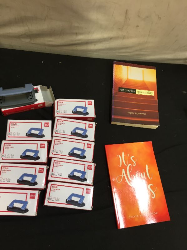 Photo 1 of 2 hole punch 10 count with 2 uplifting books 