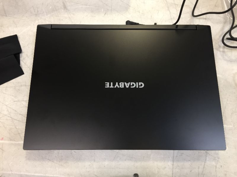 Photo 4 of GIGABYTE G5 MD - 15.6" FHD IPS Anti-Glare 144Hz, Intel Core i5, NVIDIA GeForce RTX 3050 Ti Laptop GPU 4GB GDDR6, 16GB Memory, 512GB SSD, Win10 Home, Gaming Laptop (G5 MD-51US123SH) -- does not power on --
