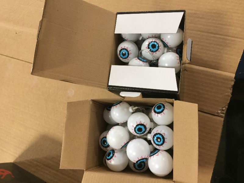 Photo 1 of 2 ---9.8FT 30LED Halloween String Lights, Eyeball Lights with Flashing/Steady on Mode, Halloween Decorations Lights Battery Operated for Indoor Outdoor Party Garden Yard Halloween Decor (Warm White)
