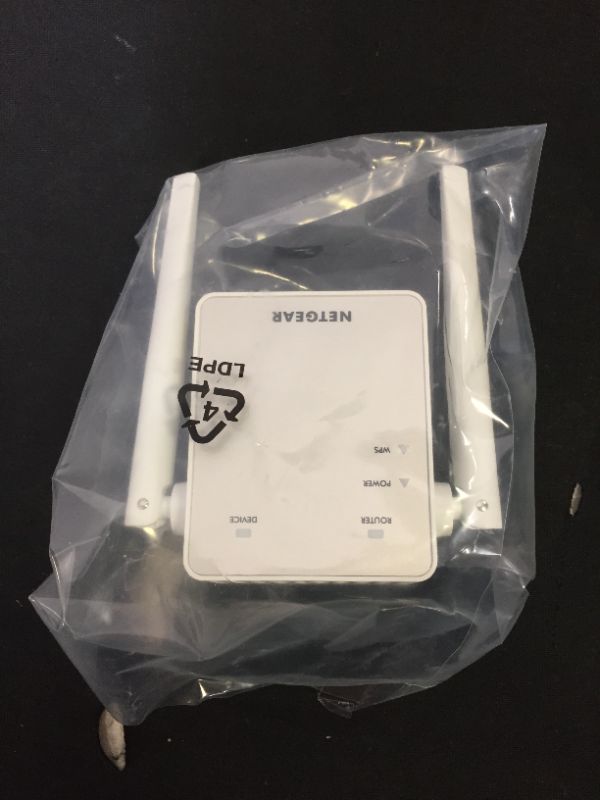 Photo 2 of NETGEAR Wi-Fi Range Extender EX6120 - Coverage Up to 1500 Sq Ft and 25 Devices with AC1200 Dual Band Wireless Signal Booster & Repeater (Up to 1200Mbps Speed), and Compact Wall Plug Design
