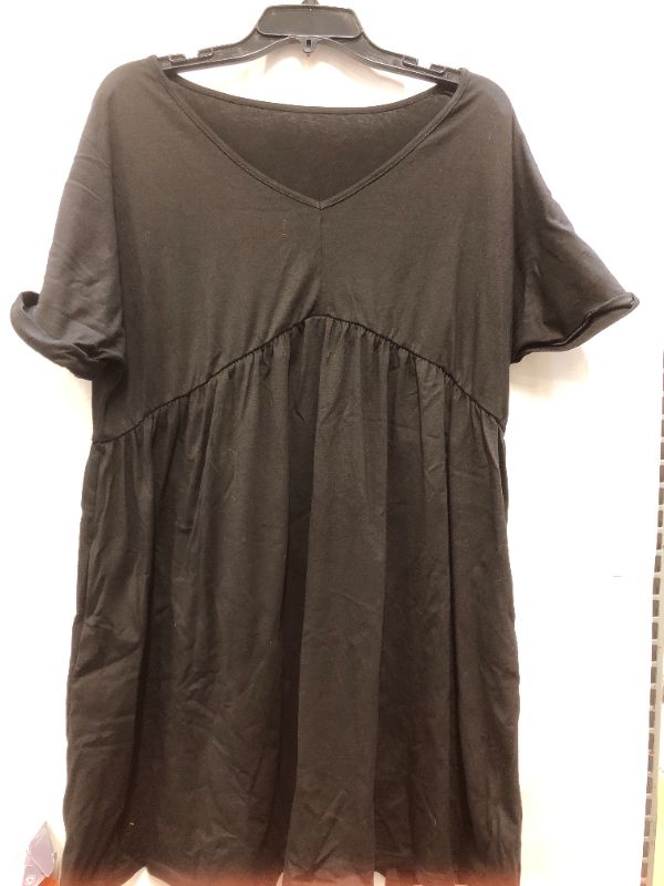 Photo 1 of Women's flowy black t-shirt ( size unknown but looks like an xl ) 