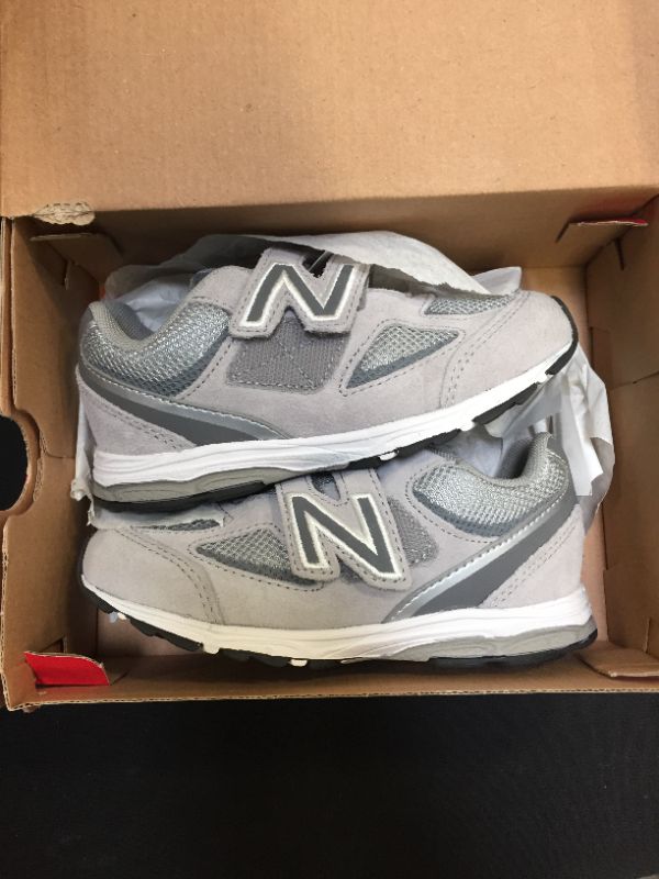 Photo 2 of Boys wide size 10 New balance shoes 