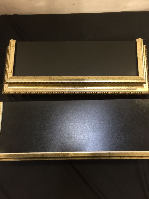 Photo 1 of 2 pack black and gold shelf ( small damage from previous use ) 