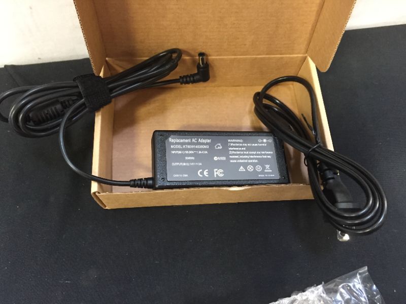 Photo 1 of replacement AC adapter KT60W140300M3