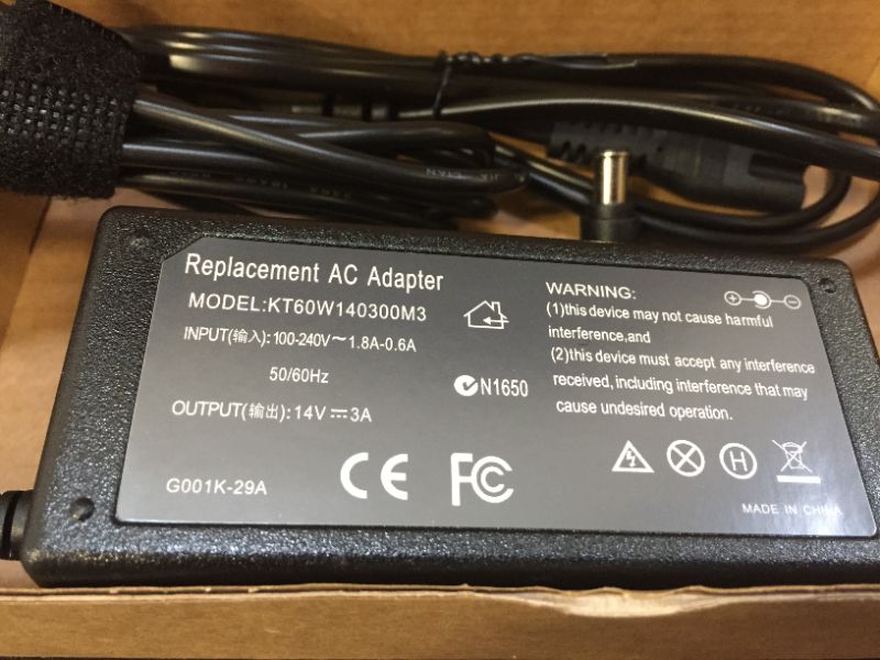 Photo 2 of replacement AC adapter KT60W140300M3