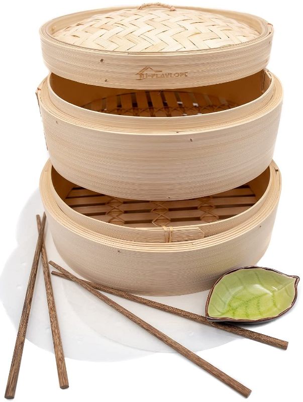 Photo 1 of 10 Inch Handmade Bamboo Steamer - Two Tier Baskets - Dim Sum Dumpling & Bao Bun Chinese Food Steamers - Steam Baskets For Rice, Vegetables, Meat & Fish Included 2 Sets Chopsticks, 20 Liners & Sauce Dish