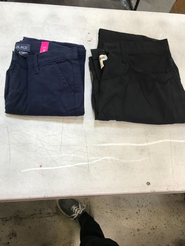 Photo 1 of 2 PANTS ONE MALE SIZE 32X32  AND FEMALE SIZE 12