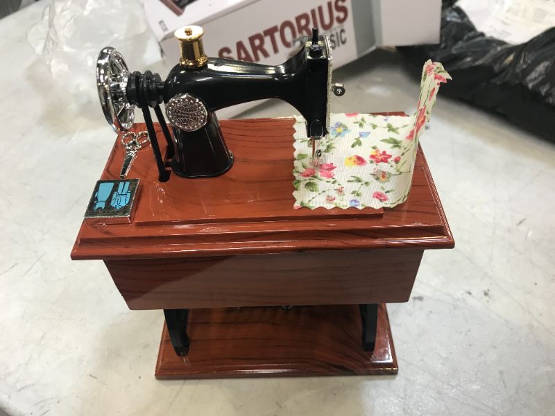 Photo 4 of OUNONA Vintage Sewing Music Box Musical Toy Sewing Machine Music Sartorius Model Play Creative Gift
