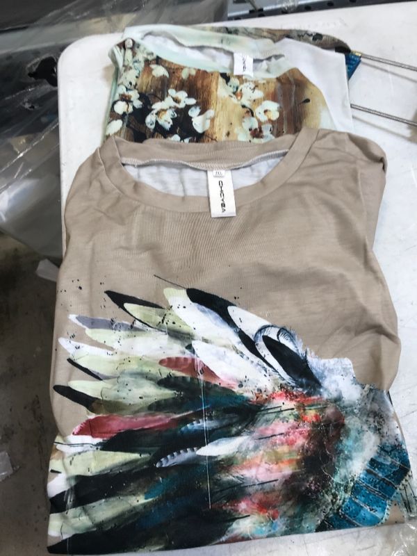 Photo 1 of 3 pairs of patterned 2xl shirts 