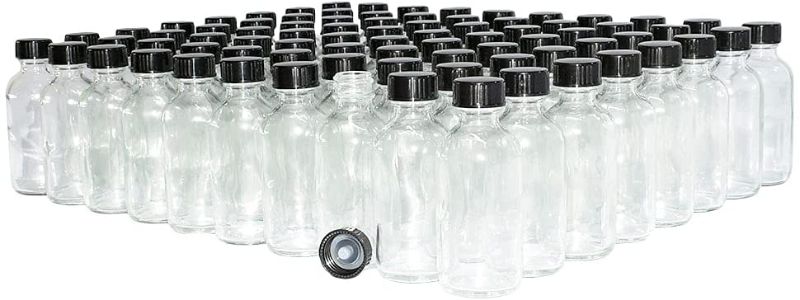 Photo 1 of (Pack of 80) 2 oz. Clear Boston Round with Black Poly Cone Cap
