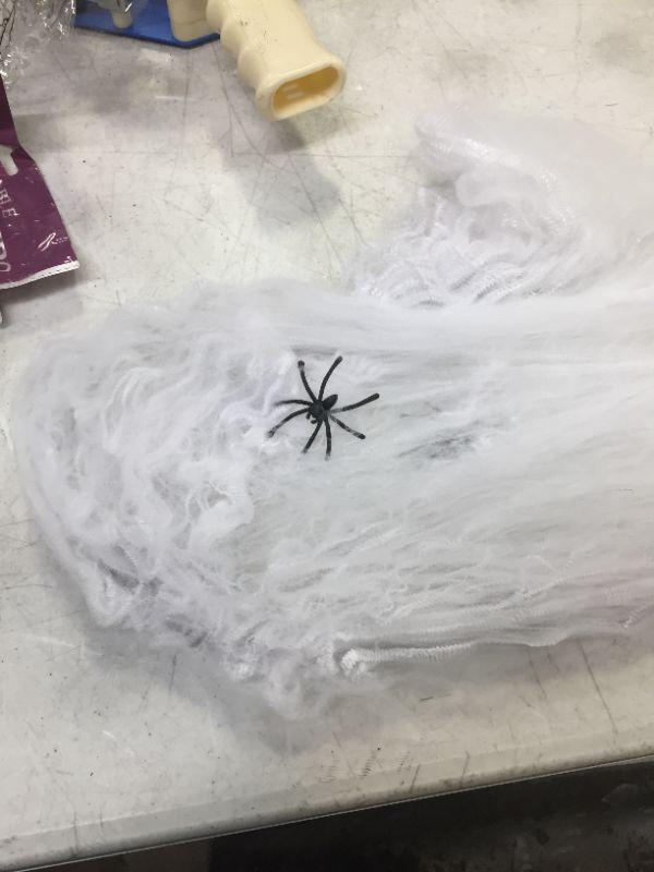 Photo 1 of 5 pack of SeasonsTrading White Stretchable Spider Web with Spiders - Halloween Decoration