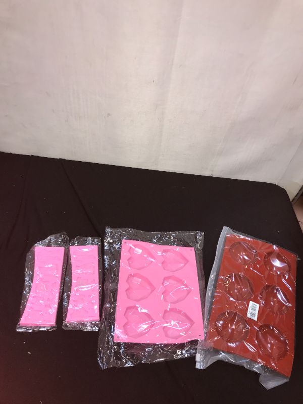 Photo 1 of 4 pack variety of molds 