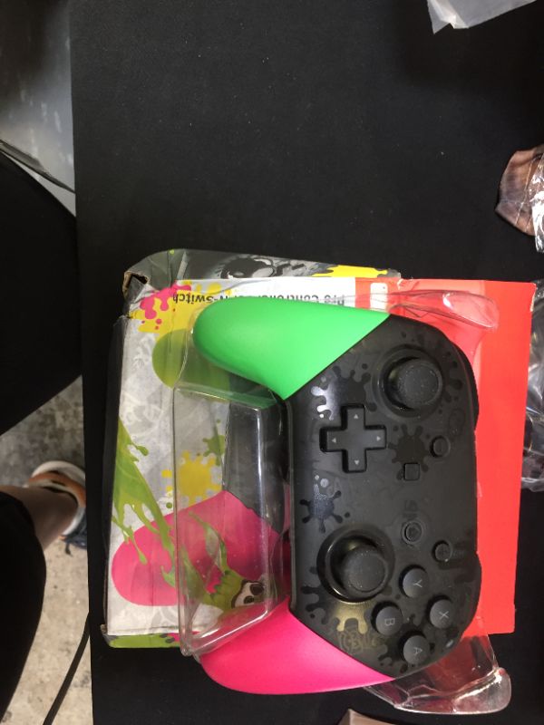 Photo 1 of generic switch controller green and pink