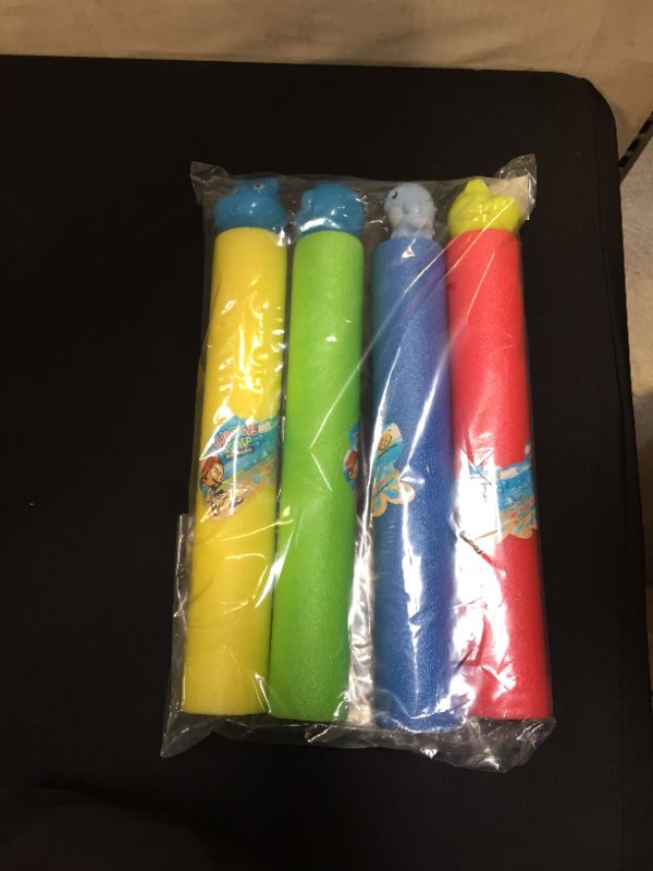 Photo 2 of 4 pack water blasters 