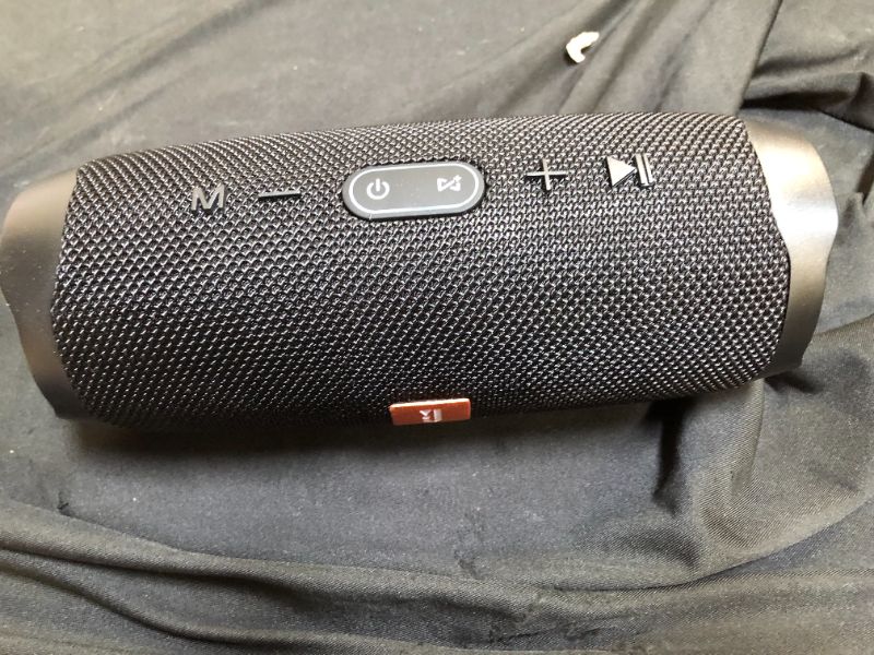 Photo 1 of generic portable wireless speaker 