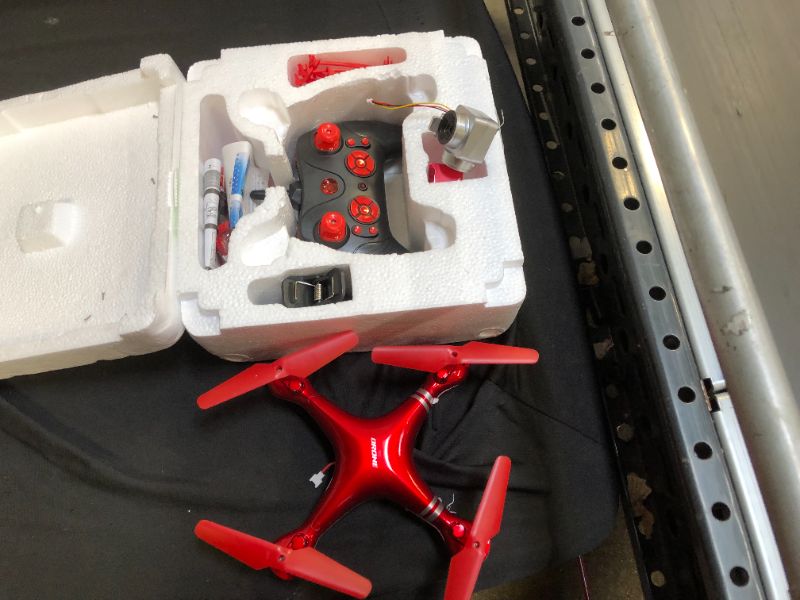 Photo 1 of generic red toy drone 