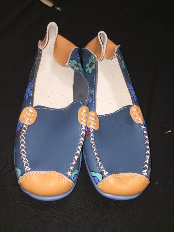 Photo 1 of blue shoes unknown size 9.5 inches