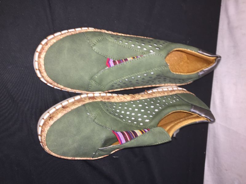 Photo 1 of green shoes unknown size 10.5 inches long