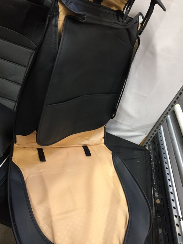 Photo 1 of driver seat passanger seat and 2 back seat Black leather seat covers and mini leather pillows 