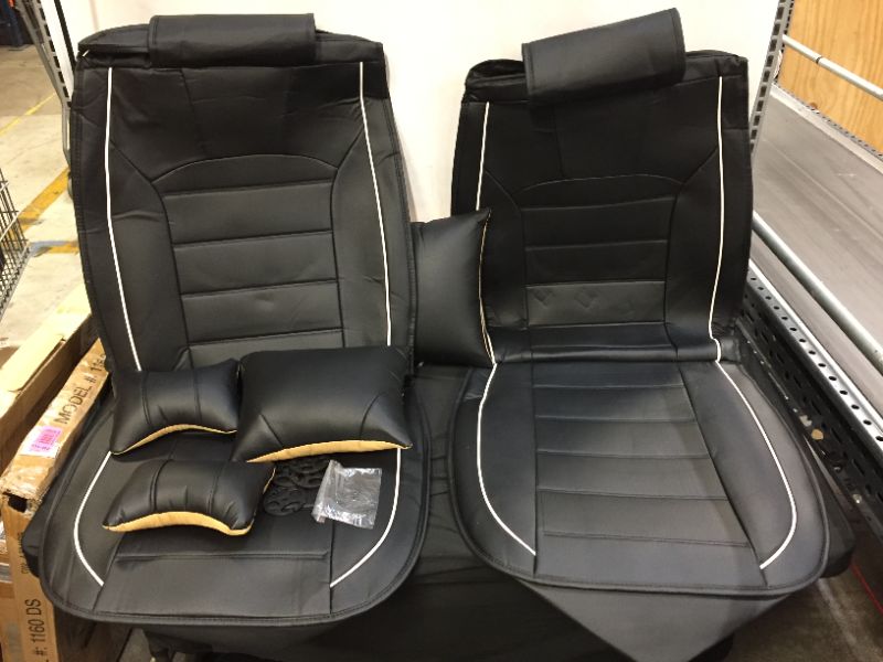 Photo 1 of driver seat passanger seat and 2 back seat Black leather seat covers and mini leather pillows 