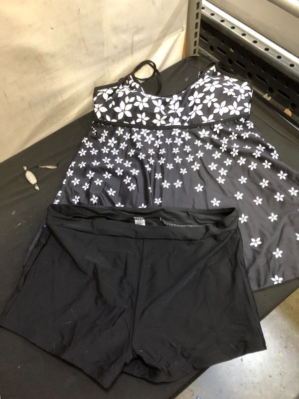 Photo 1 of WOMENS BATHING SUIT BLACK FLORAL PRINT TOP AND BLACK SHORTS
SIZE 2XL
