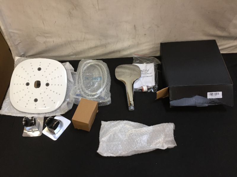 Photo 3 of DreamSpa Ultra-Luxury 9" Rainfall Shower Head/Handheld Combo. Convenient Push-Button Flow Control Button for easy one-handed operation. Switch flow settings with the same hand! Premium Chrome 4 pack 
