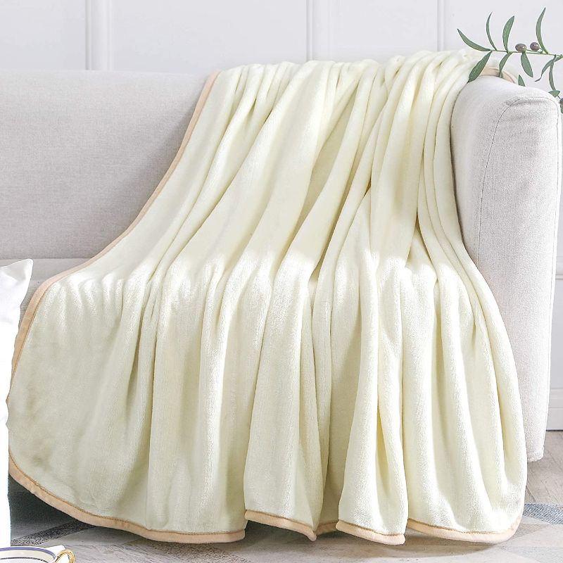 Photo 1 of Oubonun Twin Size Soft Blanket All Season Warm Microplush Lightweight Thermal Fleece Blankets for Couch Bed(Ivory, 66"x90")