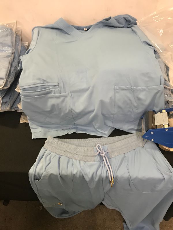 Photo 1 of MEDIUM BLUE NURSE SCRUBS 2 PACK OUTFIT