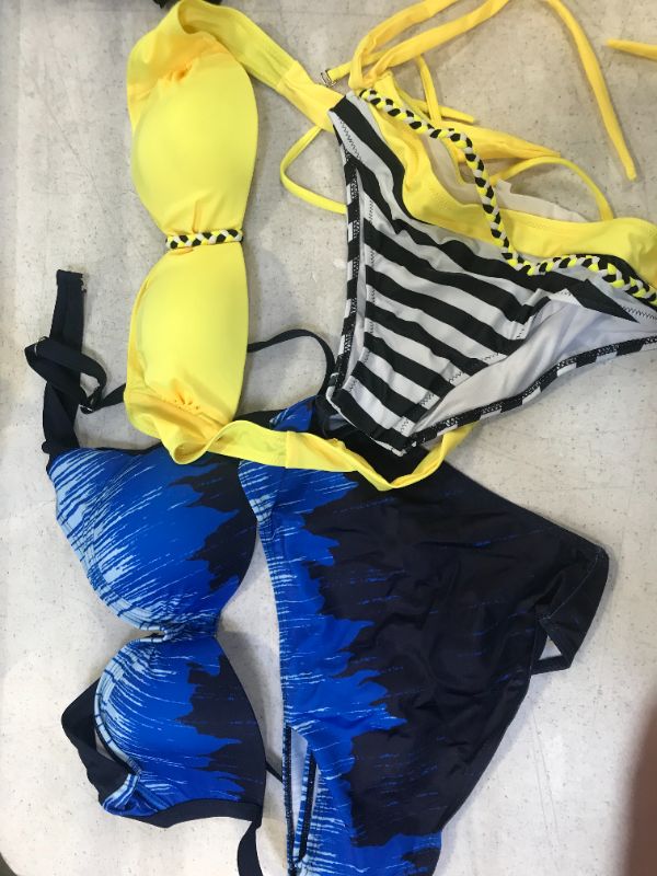 Photo 1 of 2 medium sized bathing suits 