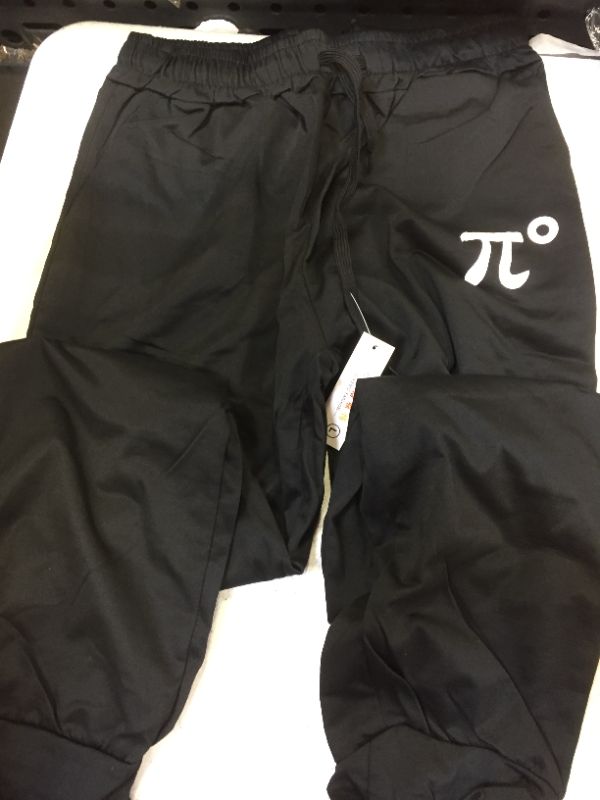 Photo 1 of large black sweats 