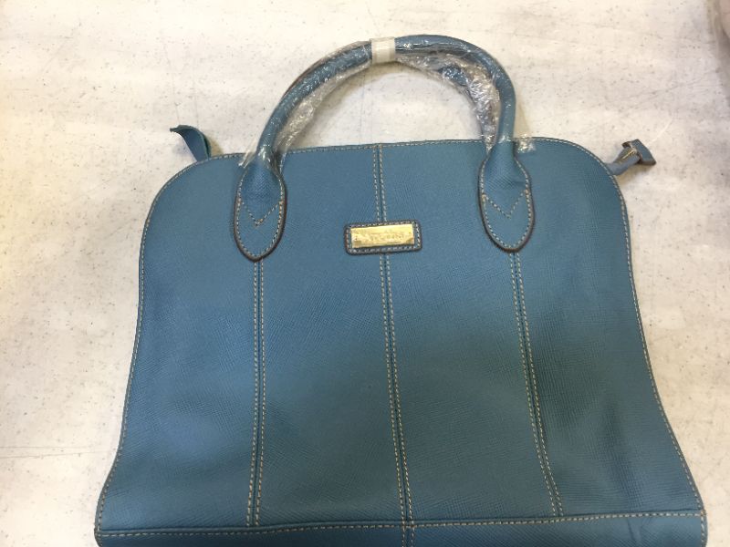 Photo 1 of blue leather bag 