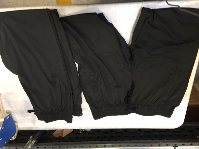 Photo 1 of 2 pairs of black large joggers 