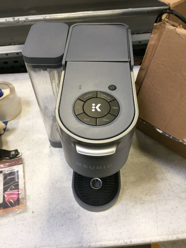 Photo 1 of Keurig K-Supreme Plus SMART Coffee Maker, Single Serve K-Cup Pod Coffee Brewer, BREWID and MultiStream Technology, 78 Oz Removable Reservoir, Brews 4 to 12oz cups, Black Stainless Steel