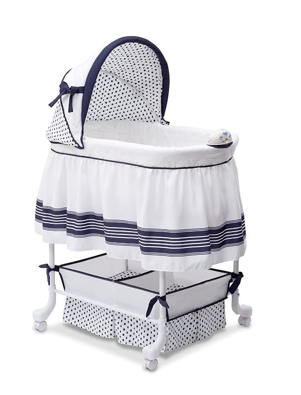 Photo 1 of Delta Children Marina Smooth Glide Bassinet