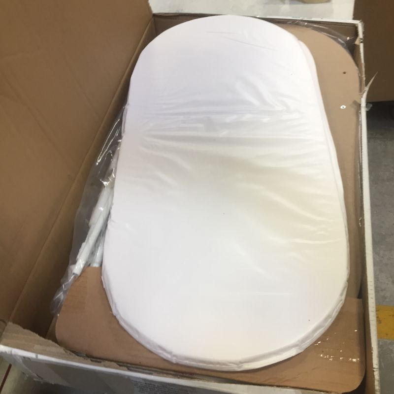 Photo 1 of Delta Children Marina Smooth Glide Bassinet
