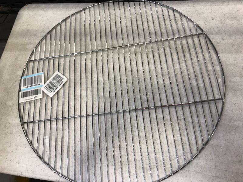Photo 1 of 2 foot round silver grill grate 
