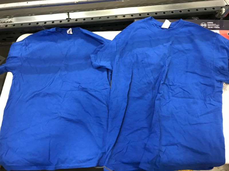 Photo 1 of 2 medium size blue shirts 