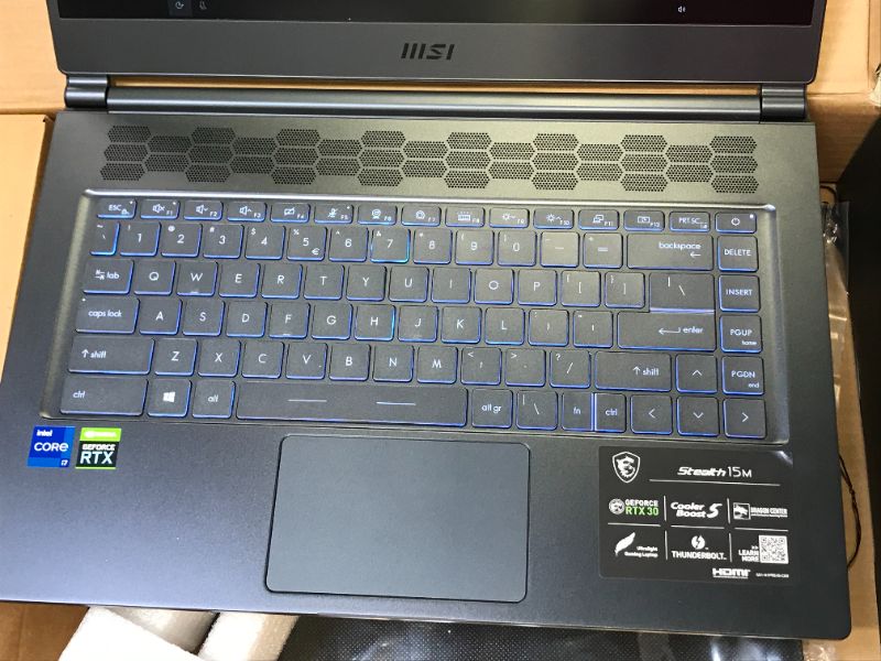Photo 3 of MSI Stealth 15M Gaming Laptop: 15.6" 144Hz FHD 1080p Display, Intel Core i7-11375H, NVIDIA GeForce RTX 3060, 16GB, 512GB SSD, Thunderbolt 4, WiFi 6, Win10, Carbon Gray (A11UEK-009)
