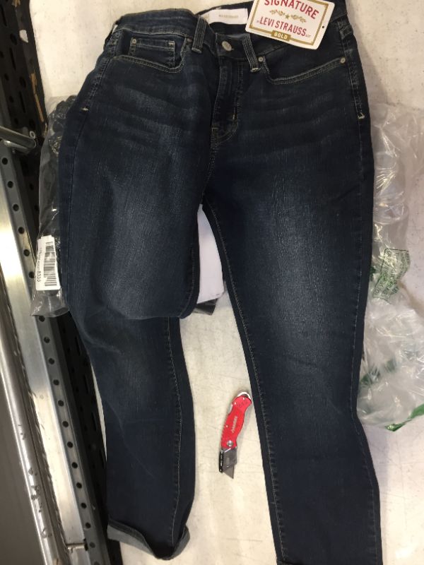 Photo 1 of womens jeans color blue size 27 W 32 L 