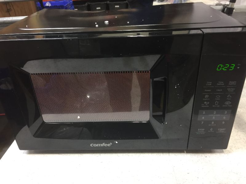 Photo 2 of COMFEE' EM720CPL-PMB Countertop Microwave Oven with Sound On/Off, ECO Mode and Easy One-Touch Buttons, 0.7cu.ft, 700W, Black (ITEM HAS DAMAGE/DENT ON BACK)