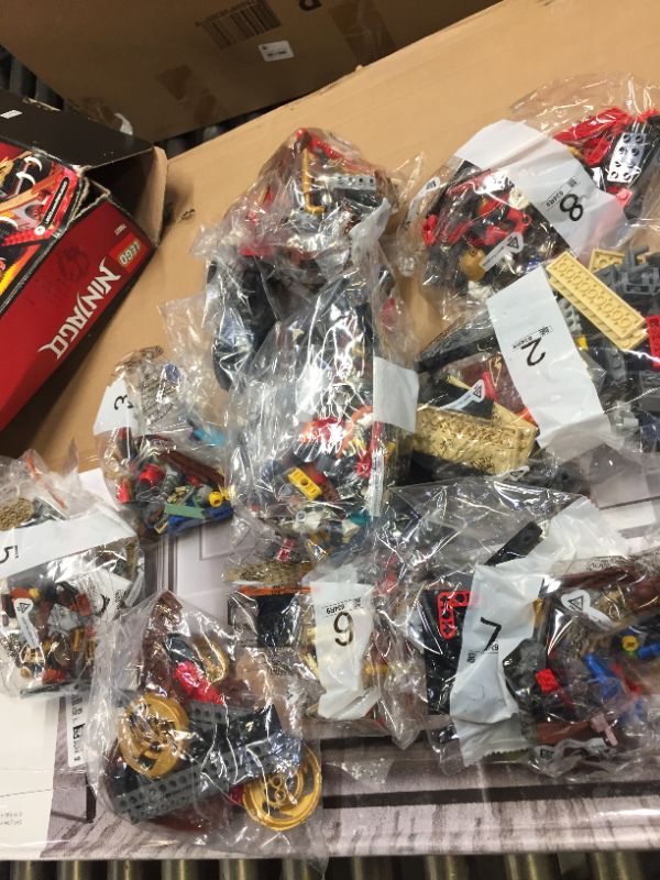 Photo 1 of ALL PACKAGES SEALED BUT ONE, INSTRUCTIONS RIPPED/MISSING LEGO Ninjago Land Bounty Building Set with Ninja Minifigures, Action Toys for Creative Play 70677