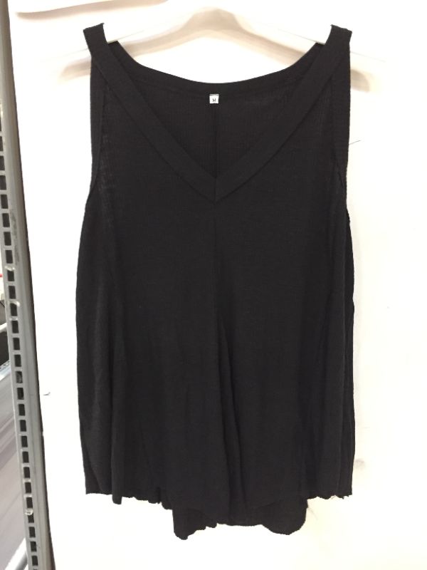 Photo 1 of WOMENS SLEEVELESS BLACK V-NECK SHIRT
SIZE MEDIUM