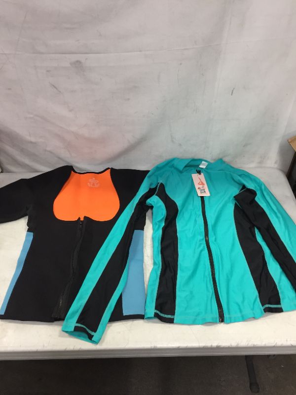 Photo 1 of 2 pack MEDIUM Womens Sports wear, long sleeve and compression SOLD AS IS