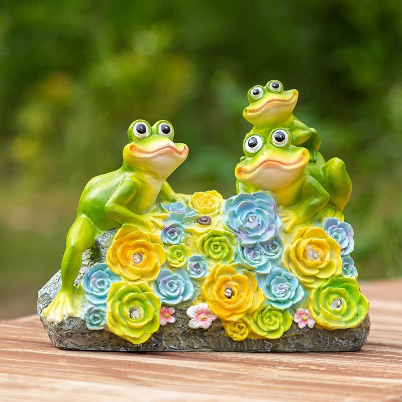 Photo 1 of CASLONEE Frogs Garden Figurines Outdoor Decor, Garden Art Outdoor for Fall Winter Garden Decor ,Outdoor Solar Statue with 6 LED for Patio,Lawn ,Yard Art Decoration , Housewarming Garden Gift
