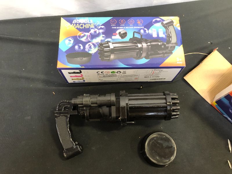 Photo 1 of BUBBLE MACHINE BUBBLE GUN GATLING BUBBLE GUN 2PK