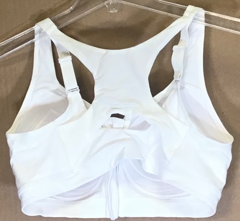 Photo 3 of Champion Women's Motion Control Zip Sports Bra Front zip closure for easy on and off  Adjustable straps. Double dry. Mesh racer back for ventilation- Built for running, training, and high intensity activities; High impact activities--White- Size 38D